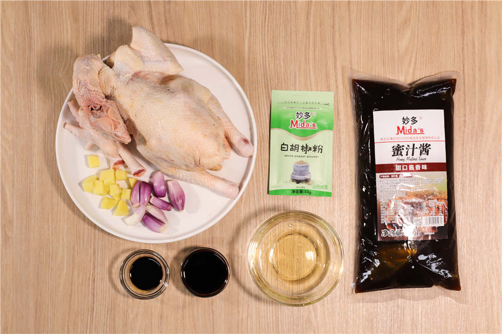 1.Prepare the auxiliary materials,clean the native chicken, and open the chicken belly .